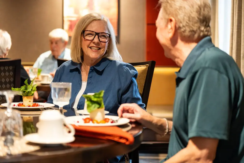 Two residents enjoy an upscale meal in one of Living Branches’ campus restaurants.