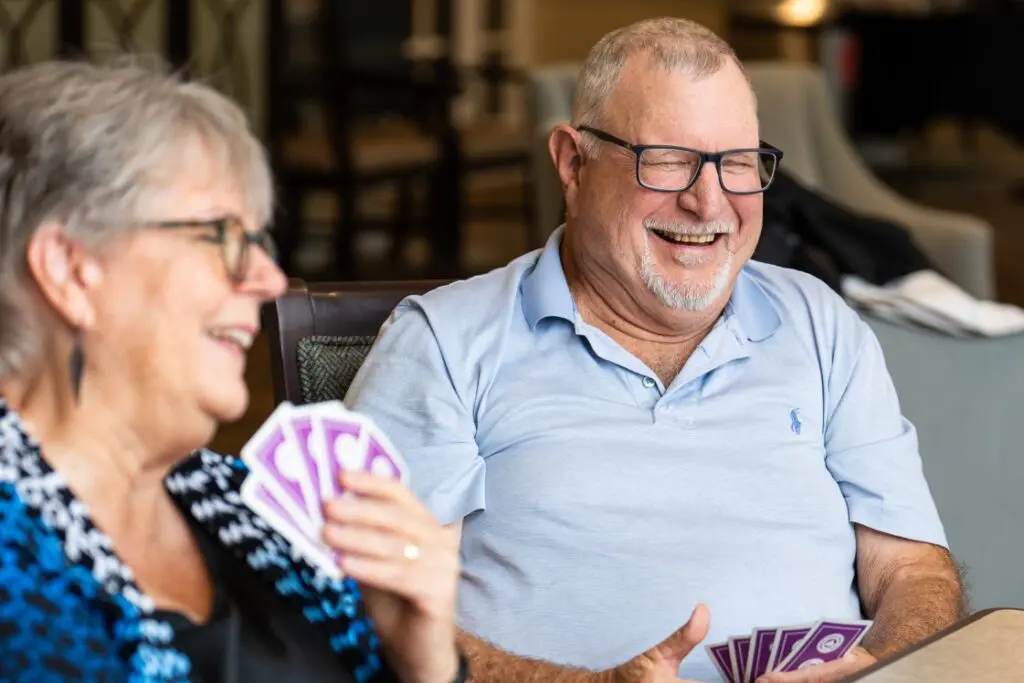 Senior Personal Care residents enjoying games with each other.