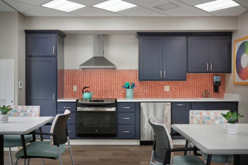 Bright, spacious activity kitchen in the Memory Care area within the skilled nursing facility at Dock Woods, a Living Branches community