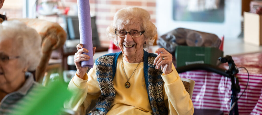 Residents at The Willows Personal Care community in Hatfield enjoy games with local students